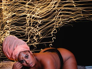 Fotografie profilu african-doll